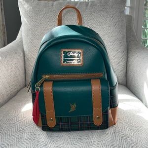 NWT Disney Peter Pan Loungefly! So cute with Tinkerbell and red feather accent.